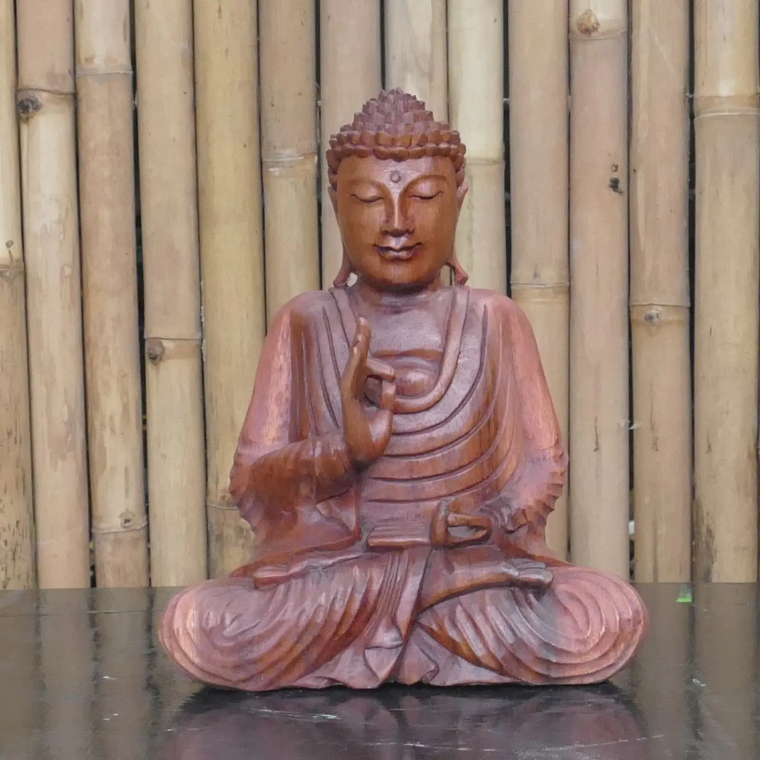  Product image 1 of the product “Seated Buddha made of wood in Abhaya Position - gesture of fearlessness, in the sizes from 30 to 40cm ”